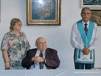 W:.M:. Jack Roark presenting the award to W:. Doyle Hollenbeck (escorted by his Daughter Joyce)