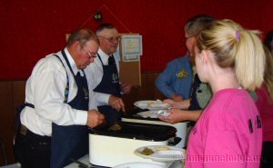 Bro. Gary & Bro. Gerald serving the food and assisted by the Job's Daughters