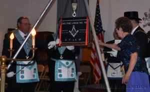 Worthy Grand Matron Jerrie Wilcox was invited to cement the stone
