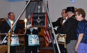 RWBro Tom Hendrickson, DGM GLofMN, was invited to cement the stone