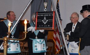 Bronze Jordan Awardee WBro Richard Mauch cementing the stone
