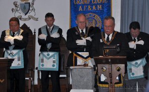 Grand Chaplain Dennis Rix pronounces the benediction.