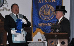 Worshipful Master Benemerito presented Grand Master Parsons a gift...